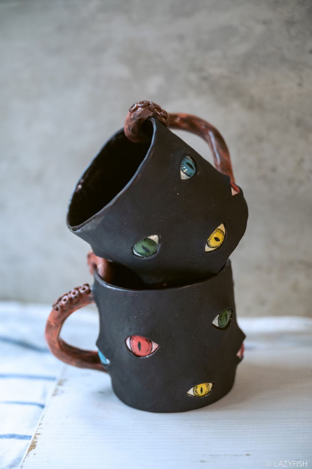 Handmade Ceramic Cat Eyes Mug with Tentacle Handle